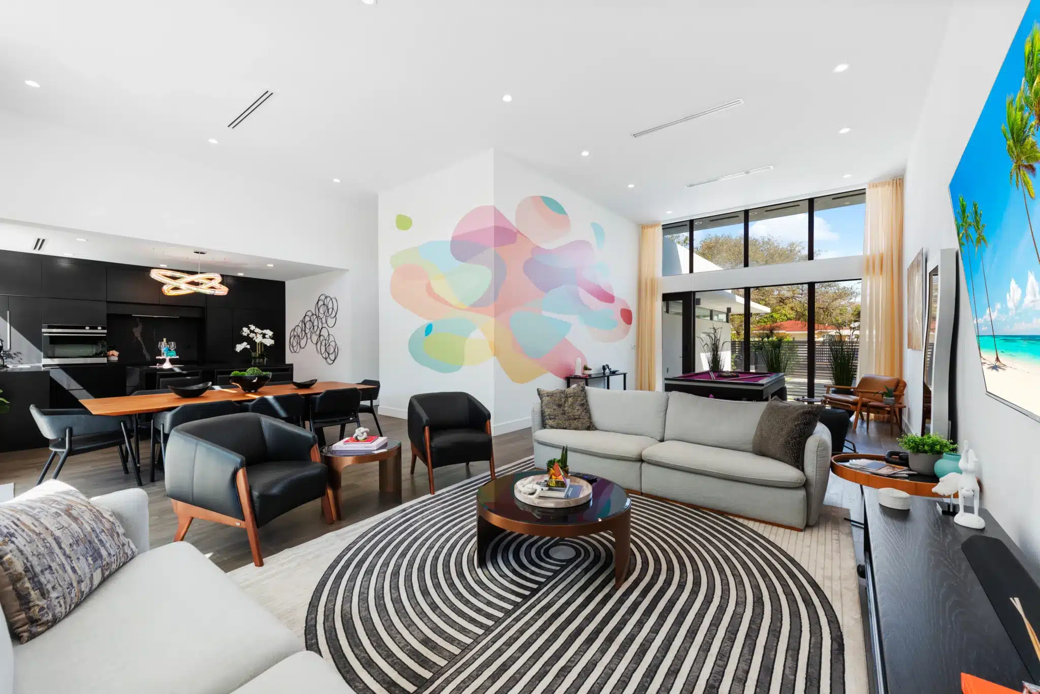 Modern living room with ocean view in a South of Fifth Miami Beach vacation rental