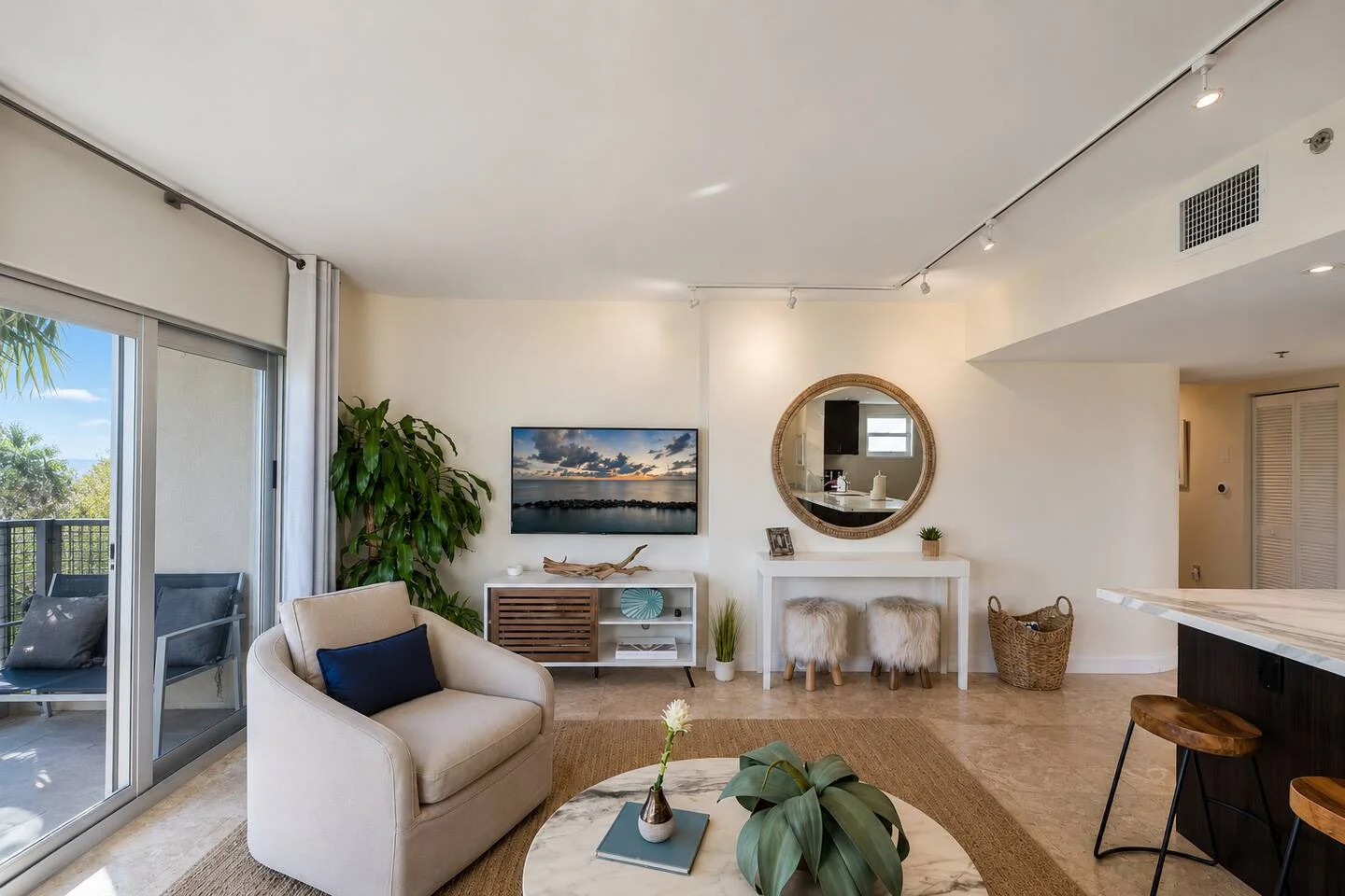 Open-concept living room at 404 360 Collins, a Miami short term rental in South of Fifth